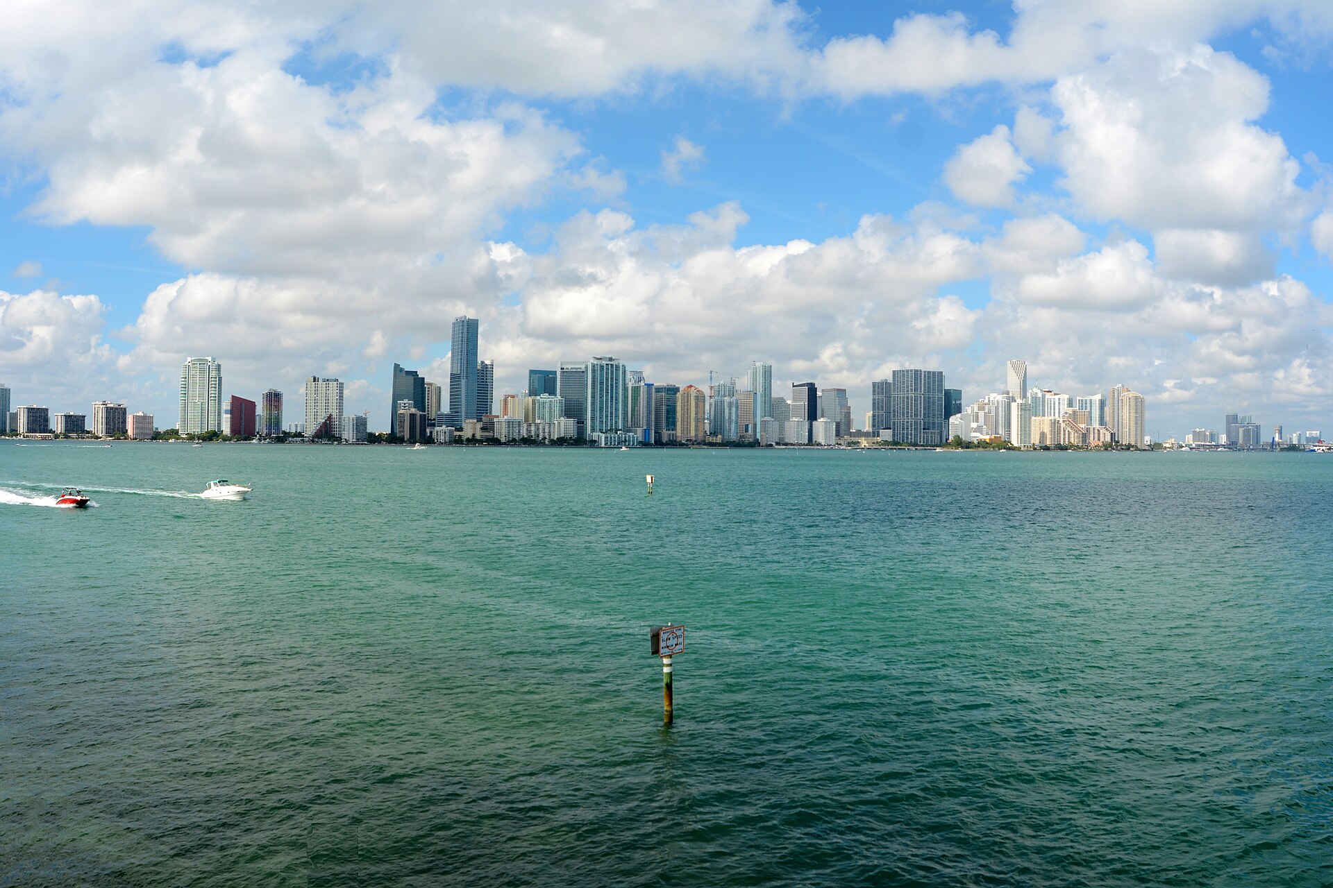 Glass tower rising over the city